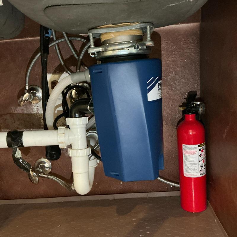 Garbage disposal replacement with new 1/2 hp unit under sink
