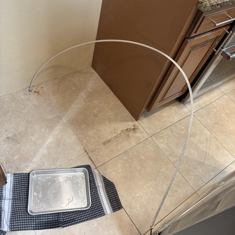 Refrigerator ice maker water line reroute and replacement