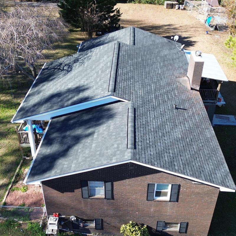 Architectural shingle roof system with clean ridge lines Architectural shingle roof system with clean ridge lines