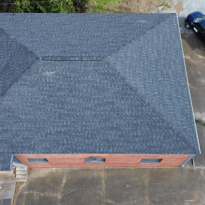 Architectural shingle roof with ridge vent and clean lines