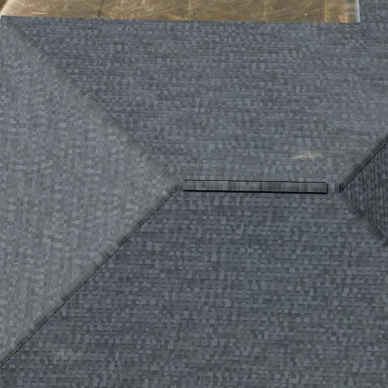 Architectural shingle roof with ridge vent and clean lines