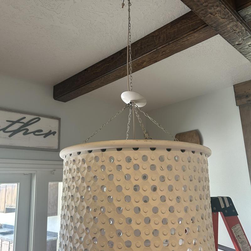 Kitchen table light fixture hanging from ceiling