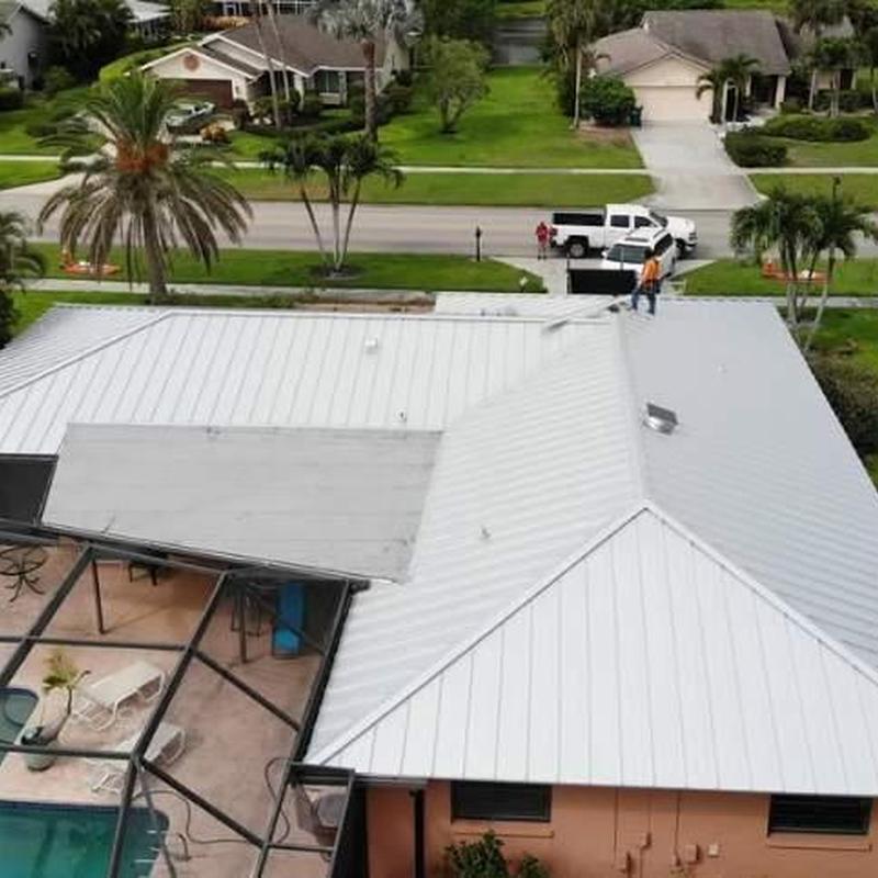 Aluminum standing seam metal roof installation in Naples
