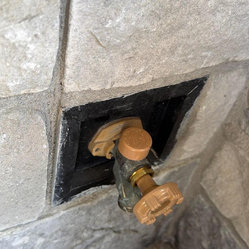 Hose bibb with vacuum breaker and new handle installed Hose bibb with vacuum breaker and new handle installed