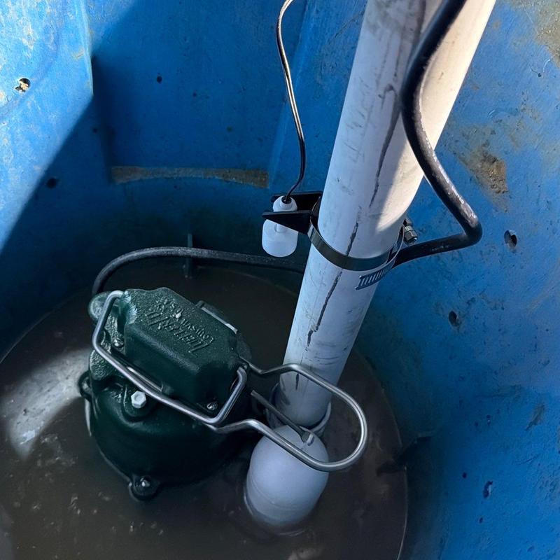 Sump pump assembly with discharge pipe and float switch Sump pump assembly with discharge pipe and float switch