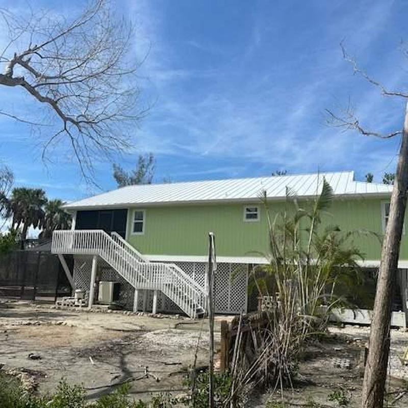 .032 aluminum standing seam roof on home