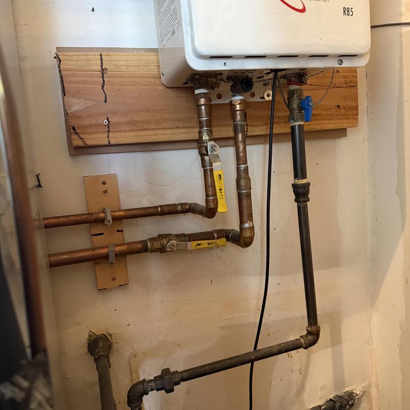 Tankless water heater pipe installation with valves Tankless water heater pipe installation with valves
