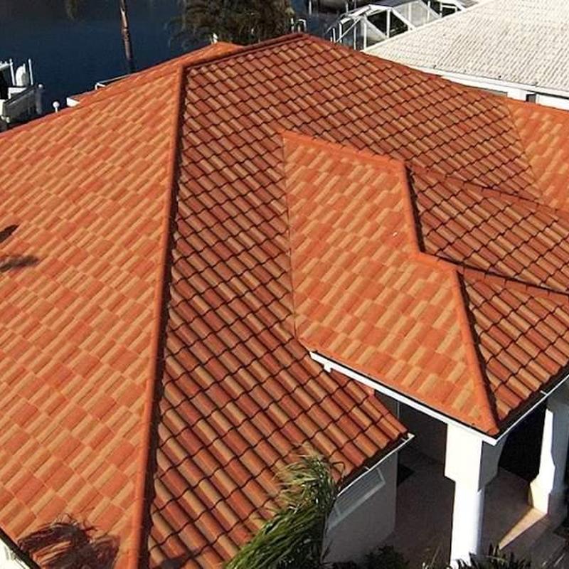 Unified Steel stonecoated steel roofing system on house Unified Steel stonecoated steel roofing system on house