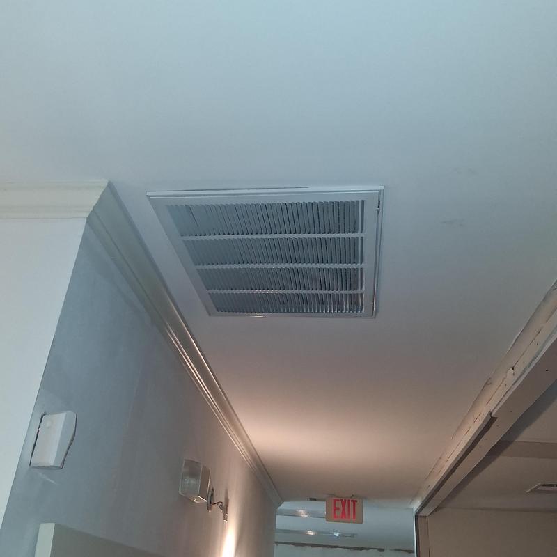 Air vent ceiling filter replacement in hallway
