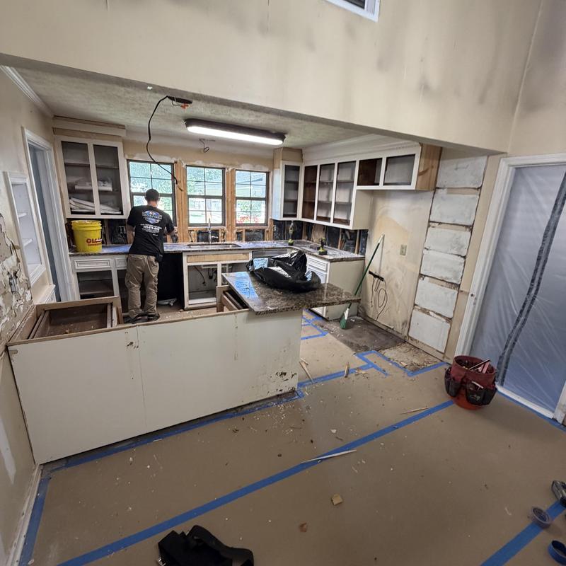 Kitchen cabinets and countertops demolition in progress