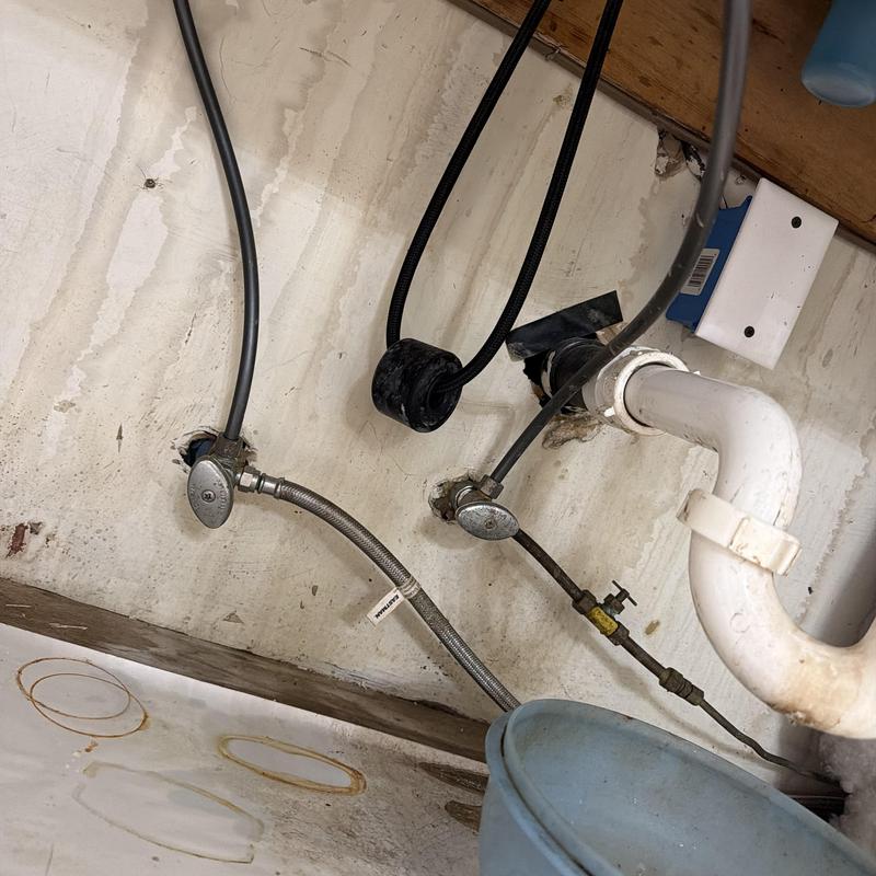 Kitchen sink plumbing and water supply lines