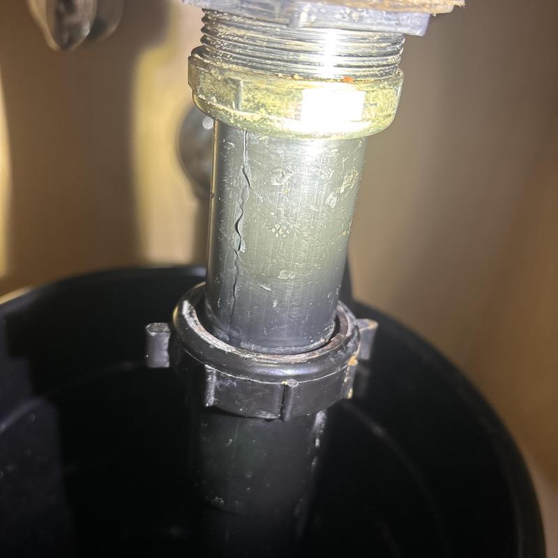 Sink drain pipe with visible crack leak risk Sink drain pipe with visible crack leak risk