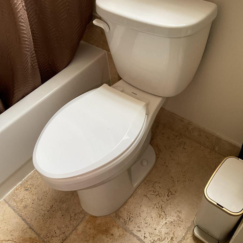 Gerber Maxwell toilet installed in bathroom corner