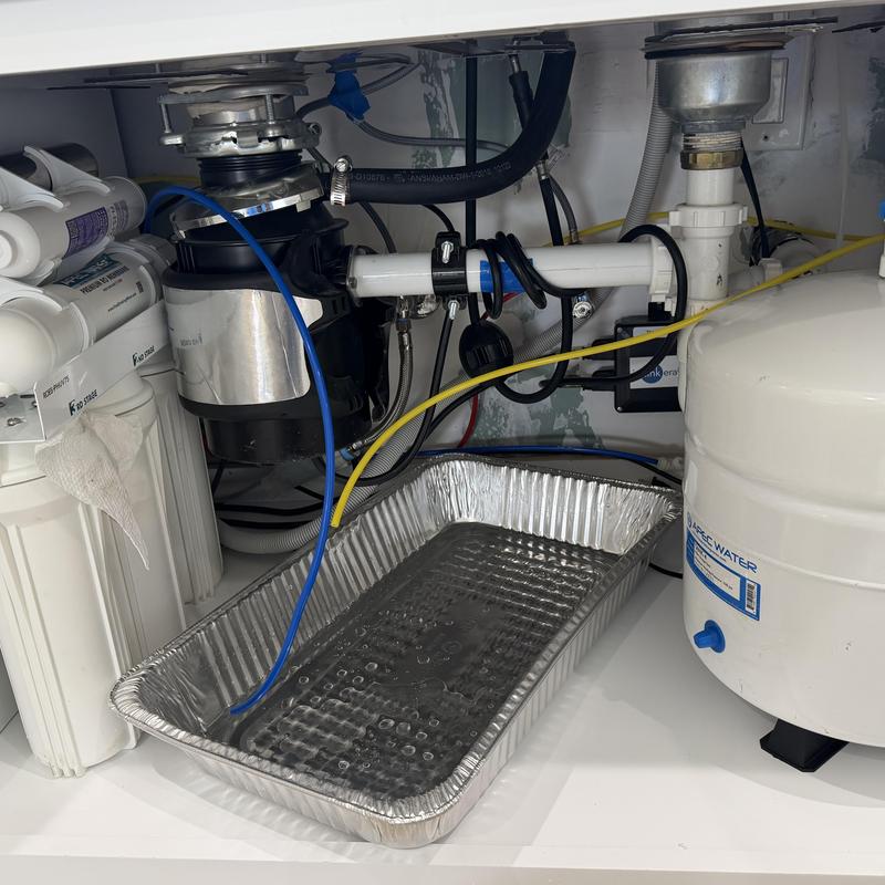 Reverse osmosis water filtration system under kitchen sink