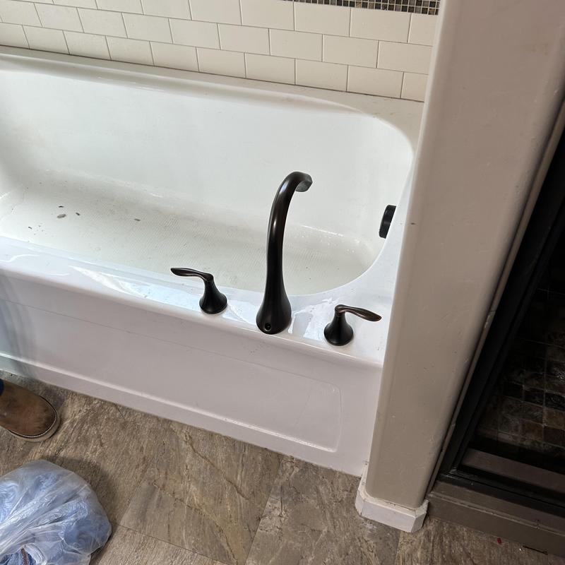 Roman tub faucet with oil-rubbed bronze finish installed