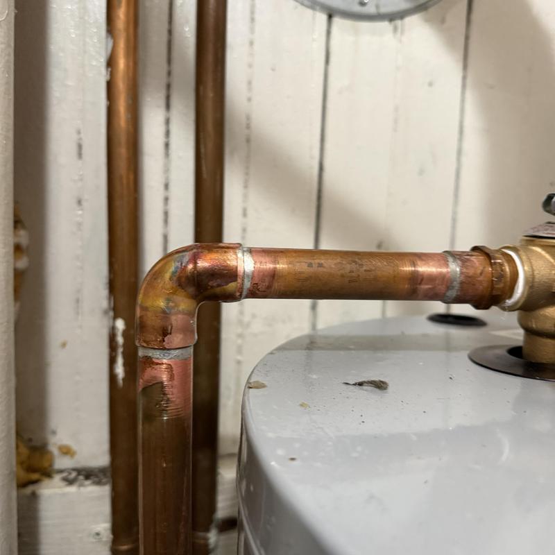 Copper water line with 90-degree fitting and adapter Copper water line with 90-degree fitting and adapter