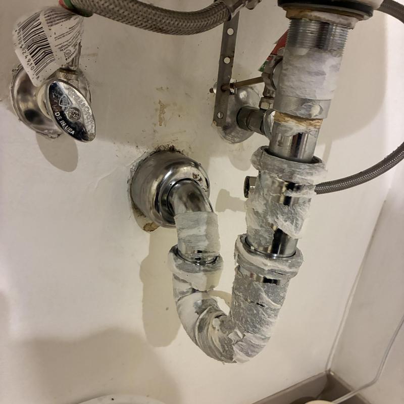 Bathroom sink P-trap and faucet supply lines with valve Bathroom sink P-trap and faucet supply lines with valve