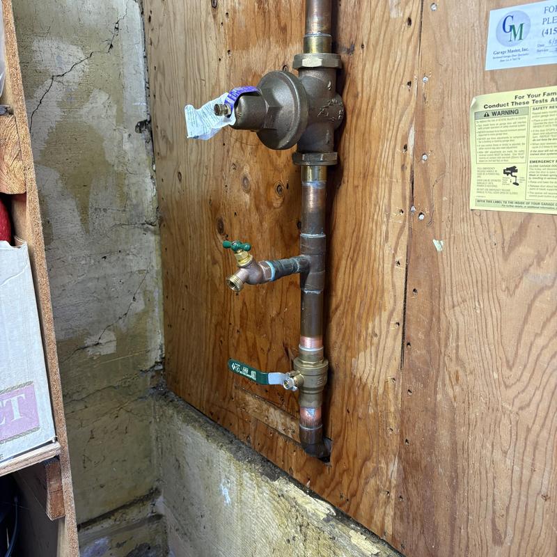 Hose bib and shut-off valve installation on wood panel Hose bib and shut-off valve installation on wood panel