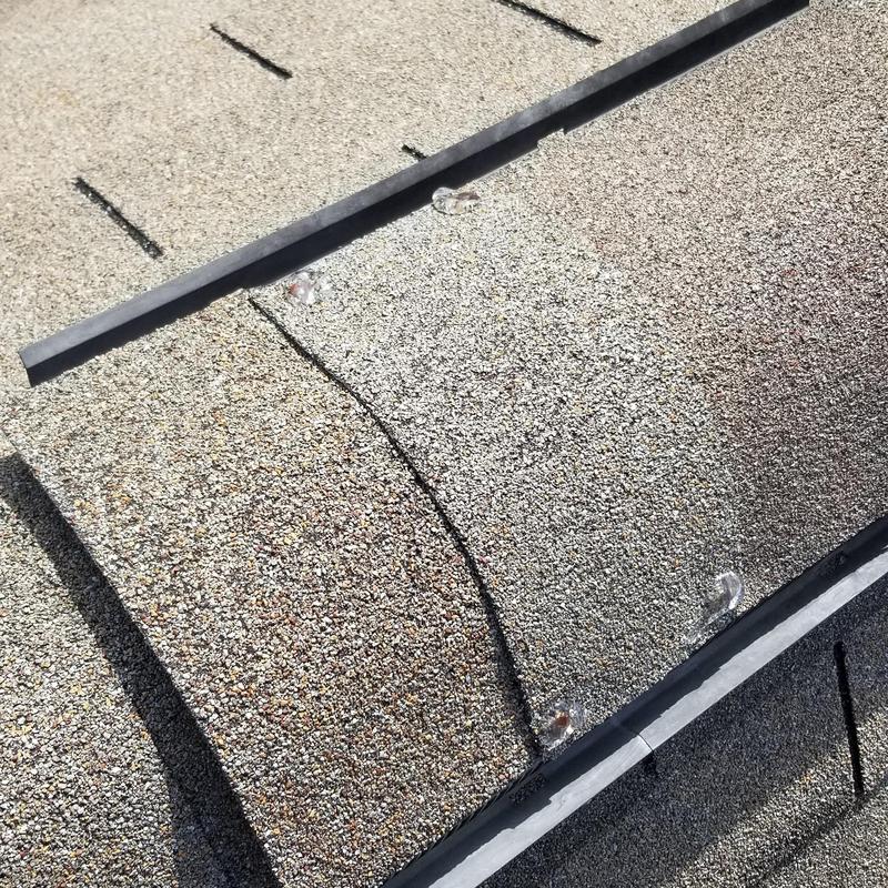 CertainTeed Landmark Pro asphalt shingles with hail damage