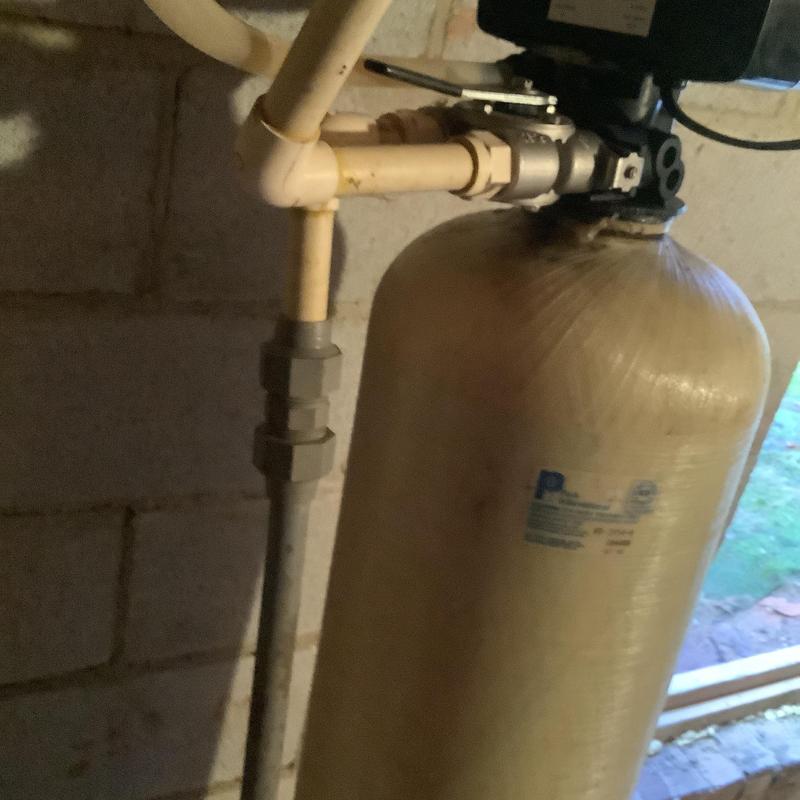 Water softener tank with PVC plumbing connections Water softener tank with PVC plumbing connections