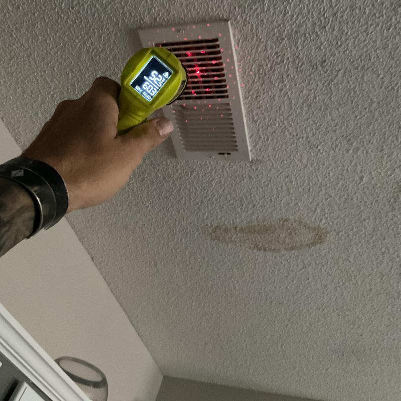 Ceiling air vent temperature checking with laser thermometer Ceiling air vent temperature checking with laser thermometer