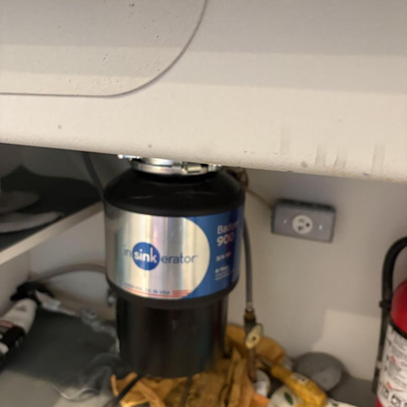 Garbage disposal unit under kitchen sink, secondary line Garbage disposal unit under kitchen sink, secondary line