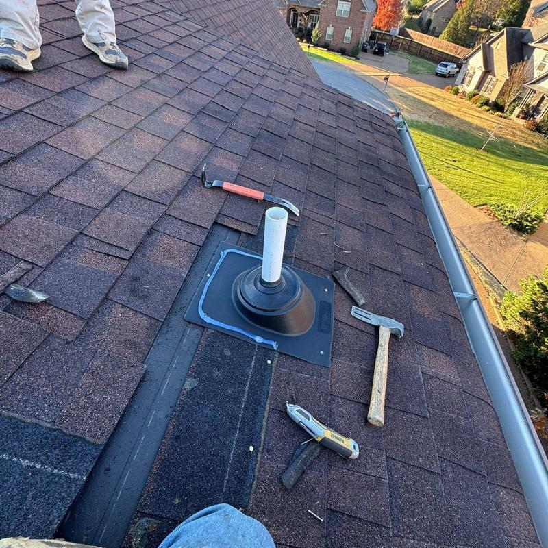 Roof flashing and vent pipe installation on asphalt shingles