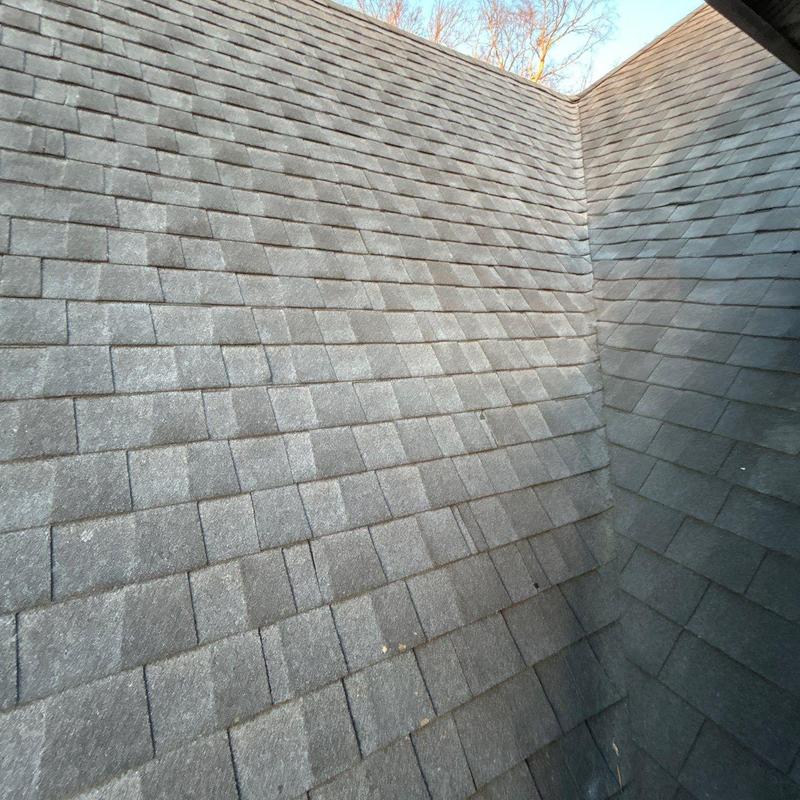 Asphalt shingle roof with hail damage inspection