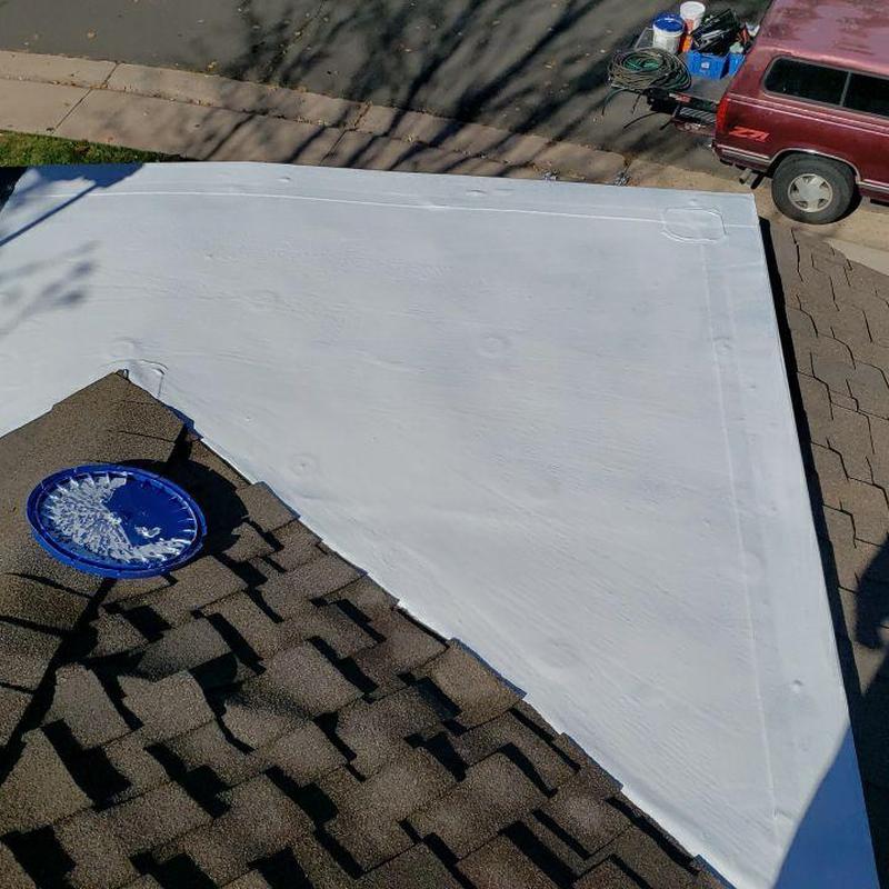 Modified flat roof with white silicone coating Modified flat roof with white silicone coating