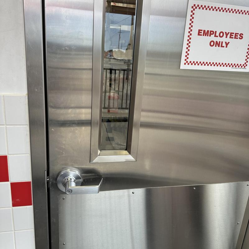 Keypad lever lock on stainless steel door Keypad lever lock on stainless steel door
