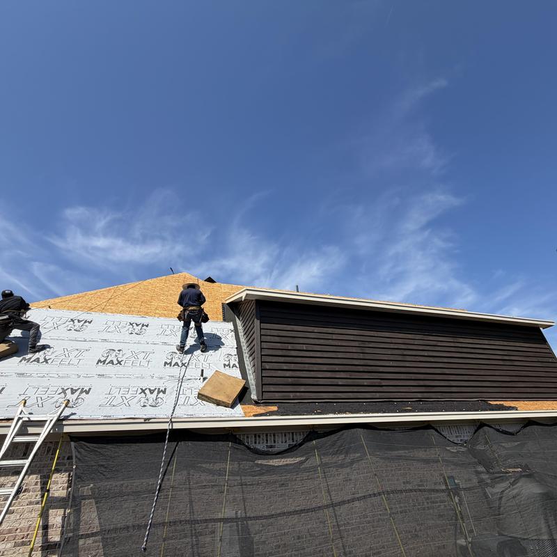 Roof decking with underlayment installation on sloped roof