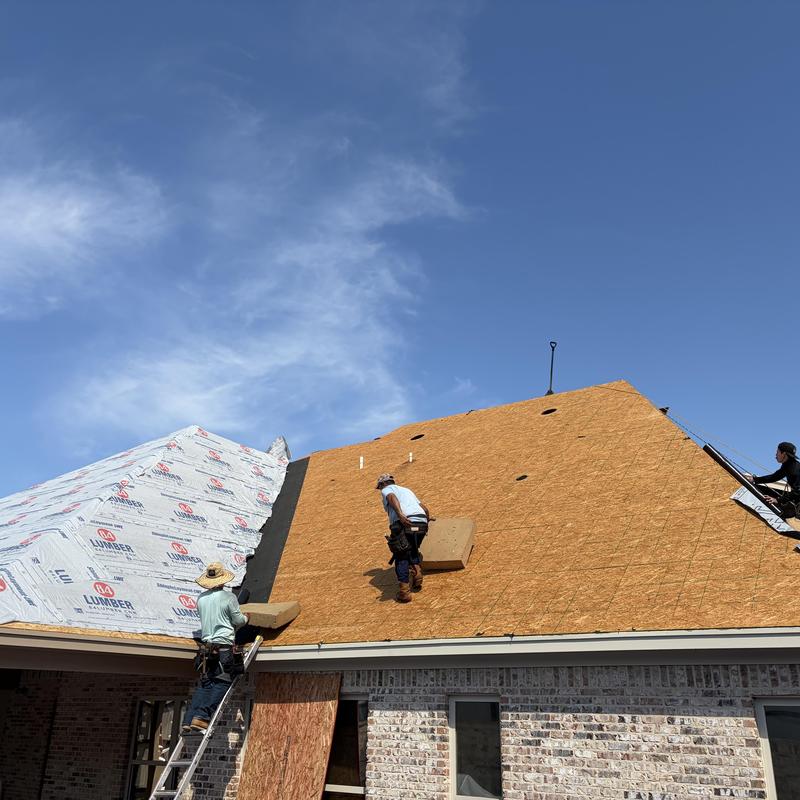 Roof decking installation and old roof system removal