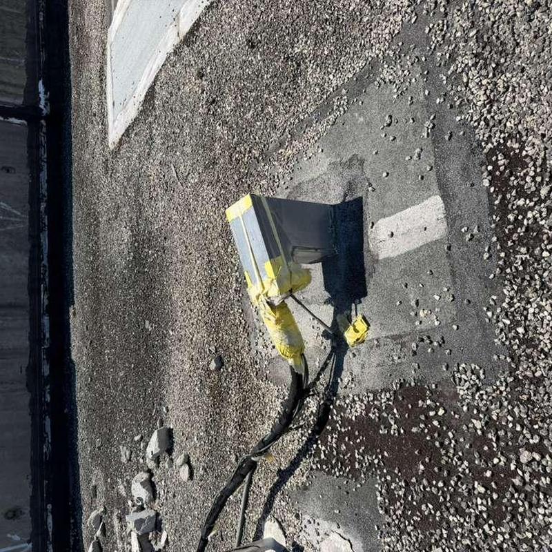 Gravel flat roof vent flashing inspection and repair Gravel flat roof vent flashing inspection and repair