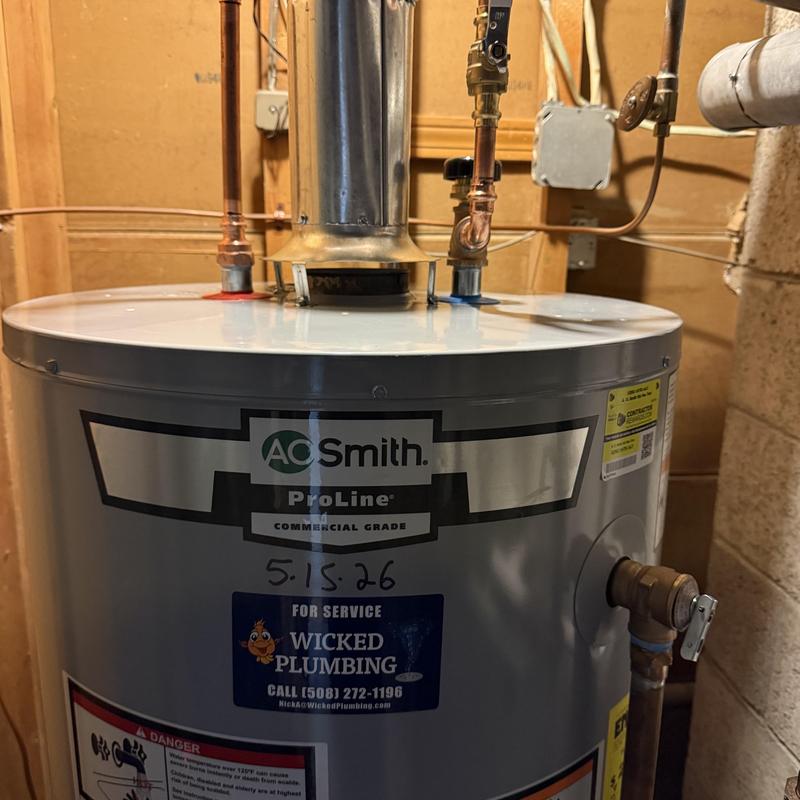 Water heater with copper pipes in basement Water heater with copper pipes in basement