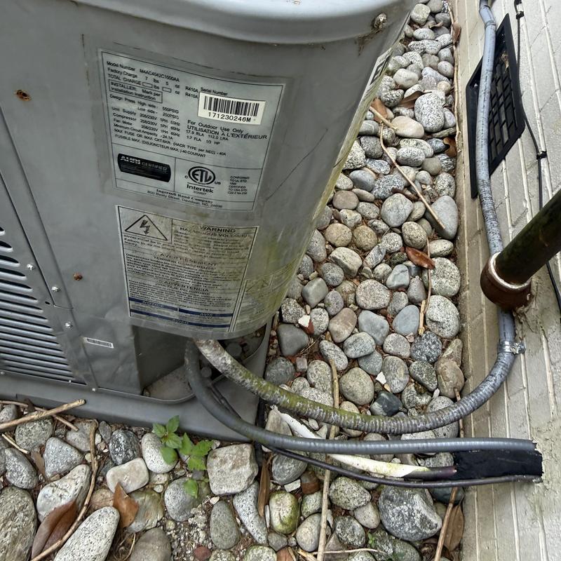 Air conditioner outdoor unit with wiring and label Air conditioner outdoor unit with wiring and label