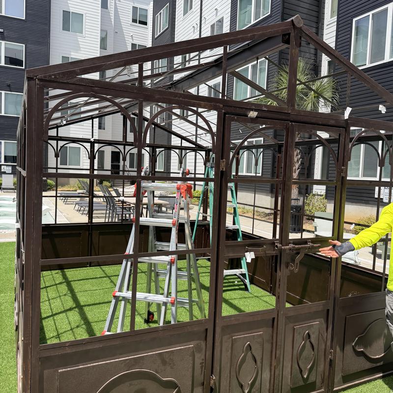 Metal frame gazebo with artificial turf installation Metal frame gazebo with artificial turf installation