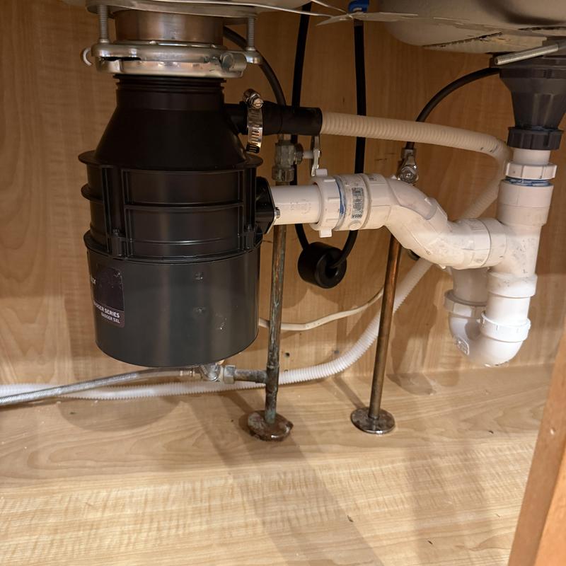 Garbage disposal and sink drain installation under cabinet Garbage disposal and sink drain installation under cabinet