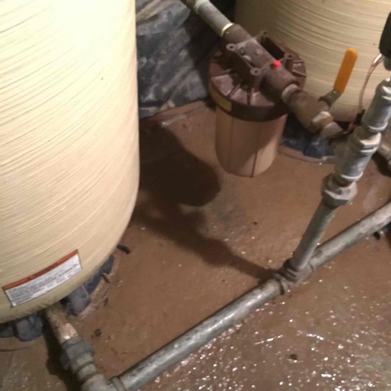 Water filtration and pressure tank system in flooded basement Water filtration and pressure tank system in flooded basement