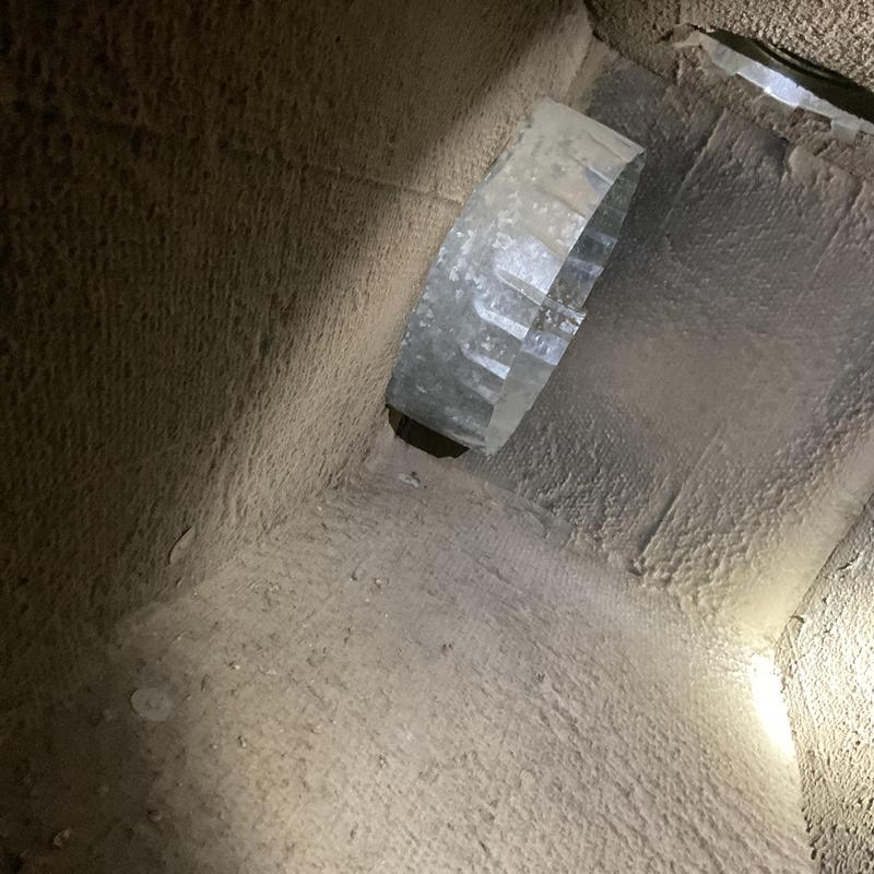 HVAC duct interior with light beam and metal collar HVAC duct interior with light beam and metal collar