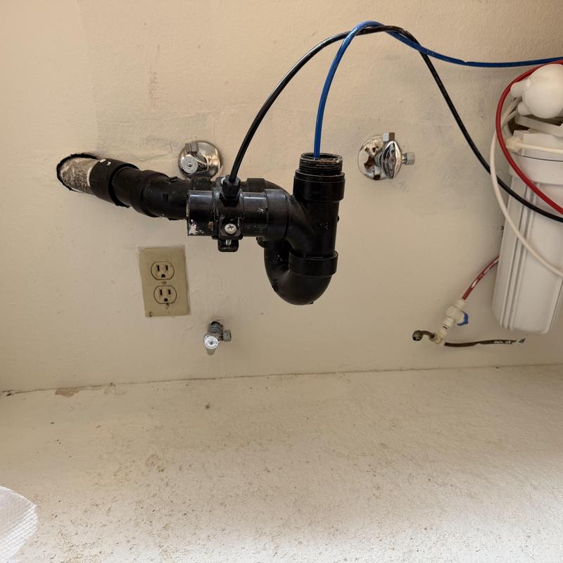Drain pipe with P-trap and water filtration system installation
