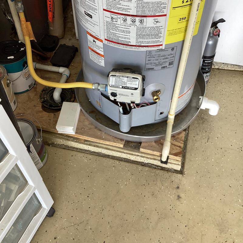 Gas water heater pilot light and temperature adjustment