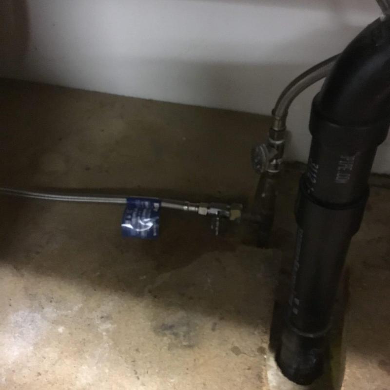 Braided dishwasher supply line and drain hookup under sink