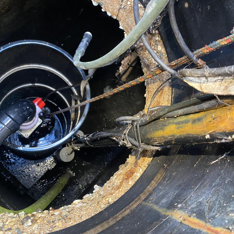Sump pump and float system inside tank riser