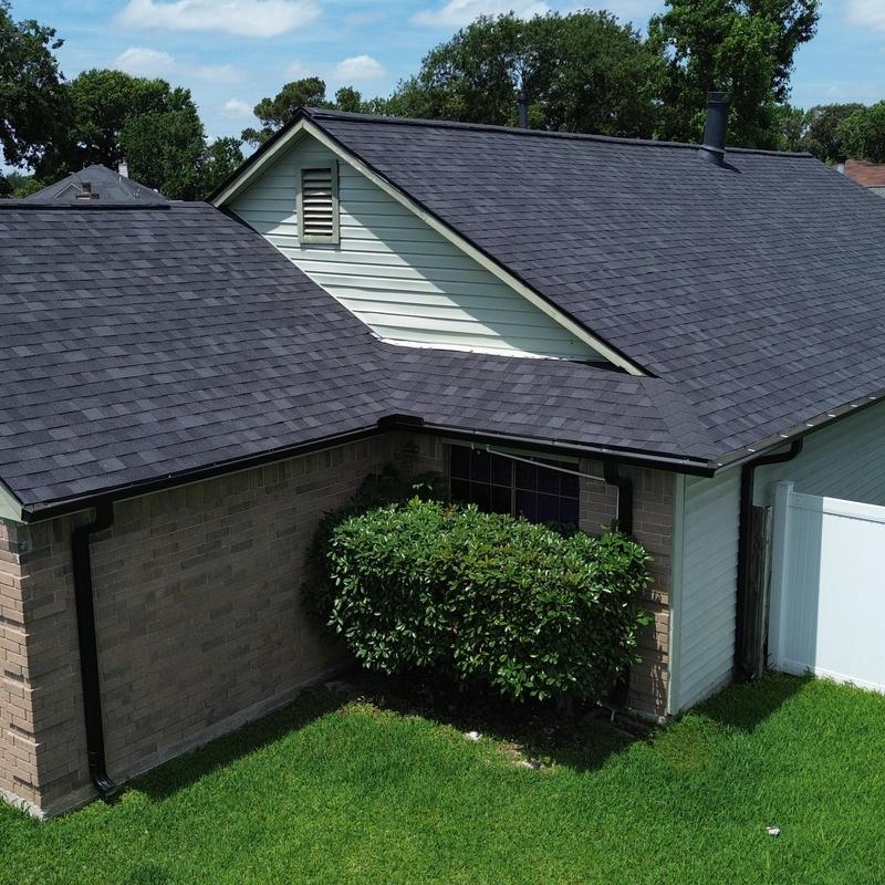 Owens Corning Onyx black roof with seamless gutters