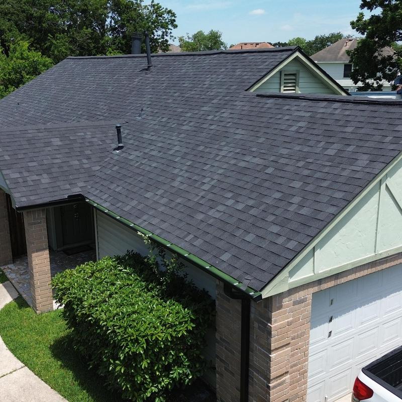 Owens Corning Onyx black roof with seamless gutters