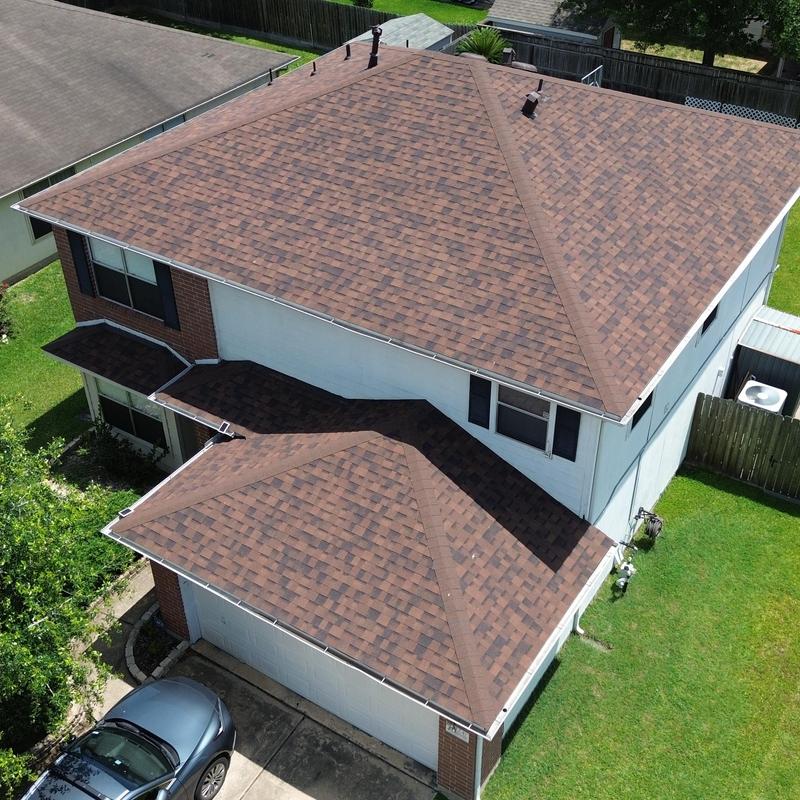 Owens Corning Brownwood shingle roof on two-story house
