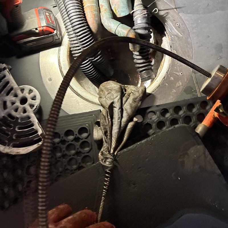 Bar sink drain clearing removing cloth rag obstruction Bar sink drain clearing removing cloth rag obstruction