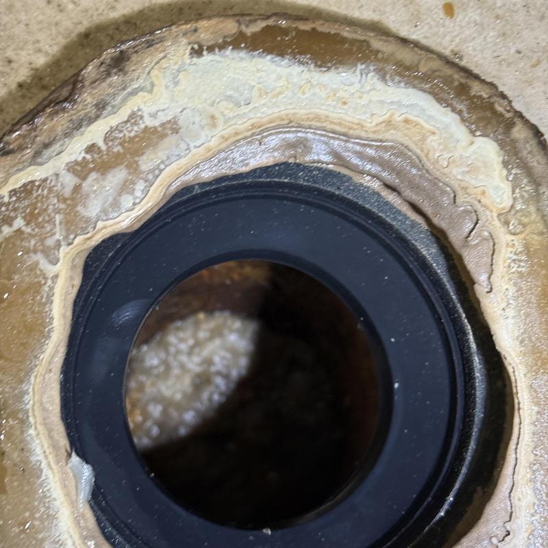 Toilet flange and wax ring seal replacement close-up Toilet flange and wax ring seal replacement close-up