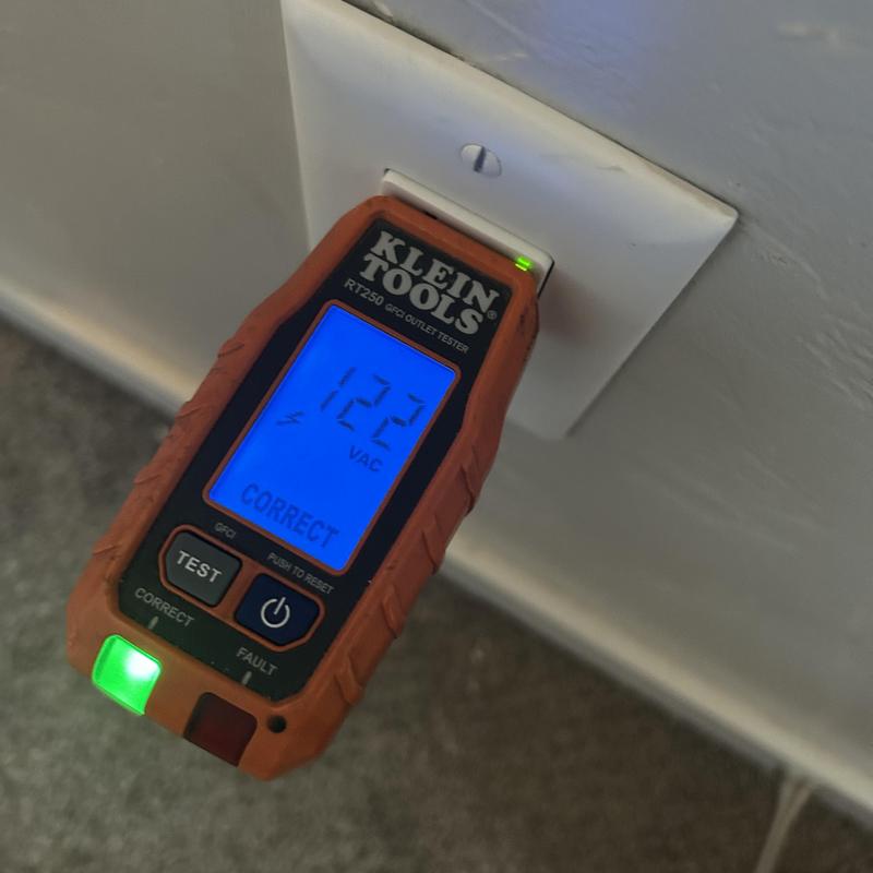Garage electrical outlet testing with Klein Tools device