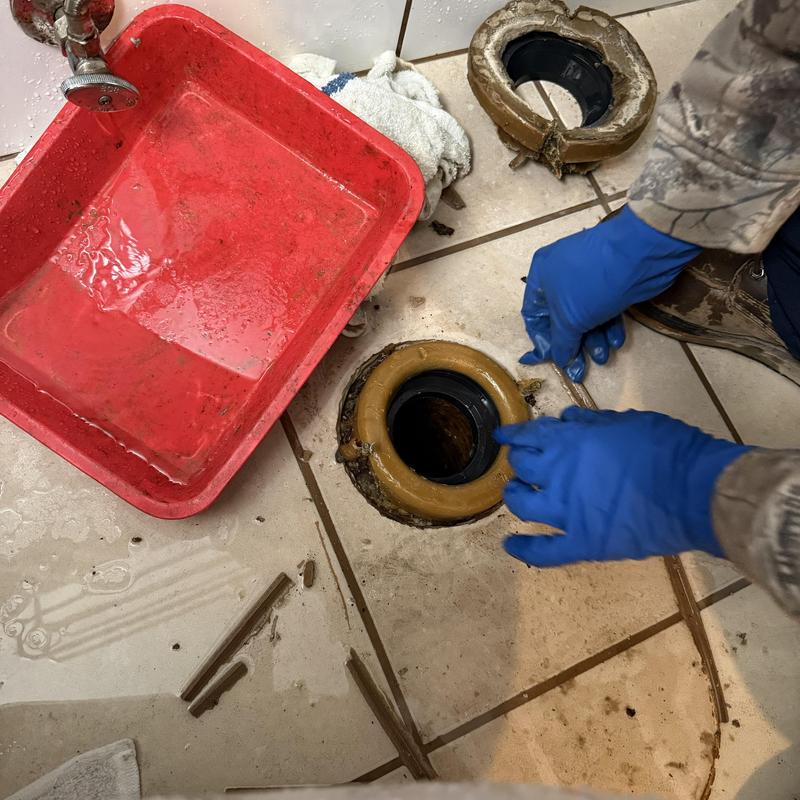Toilet flange installation with plumbing tools Toilet flange installation with plumbing tools
